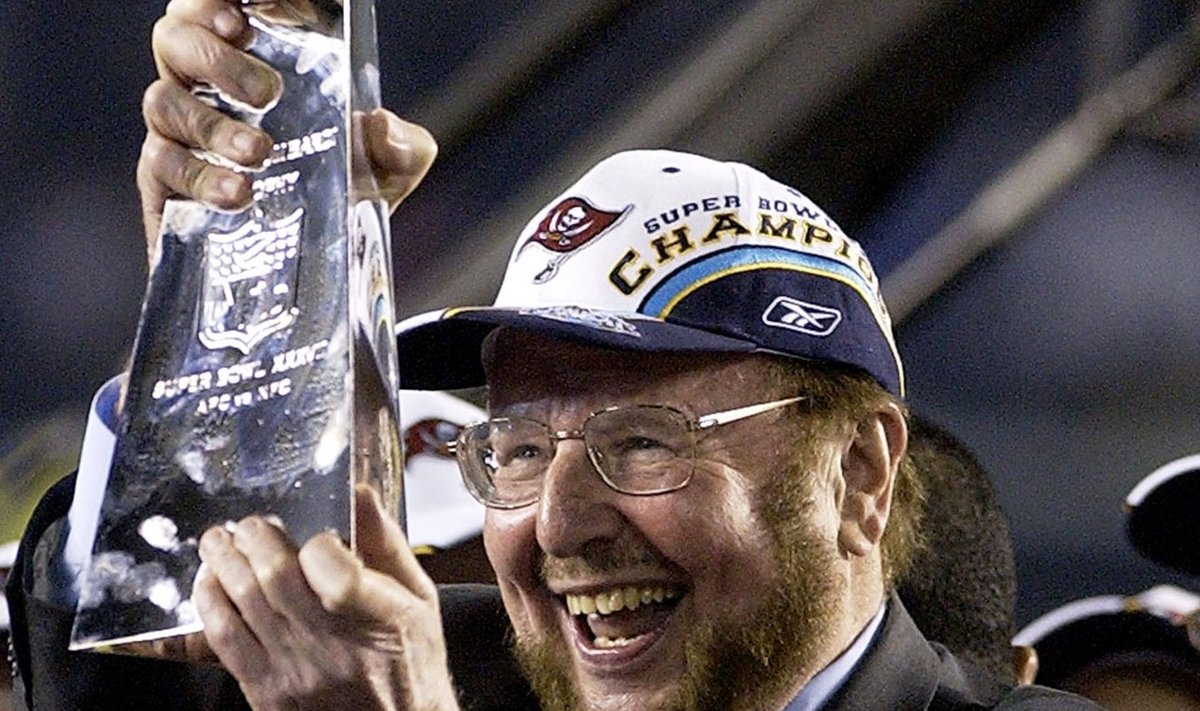 Tampa Bay Buccaneers' owner Malcolm Glazer holds the Vince Lombardi trophy after Super Bowl XXXVII, in which his team defeated the Oakland Raiders, 48-21, in San Diego