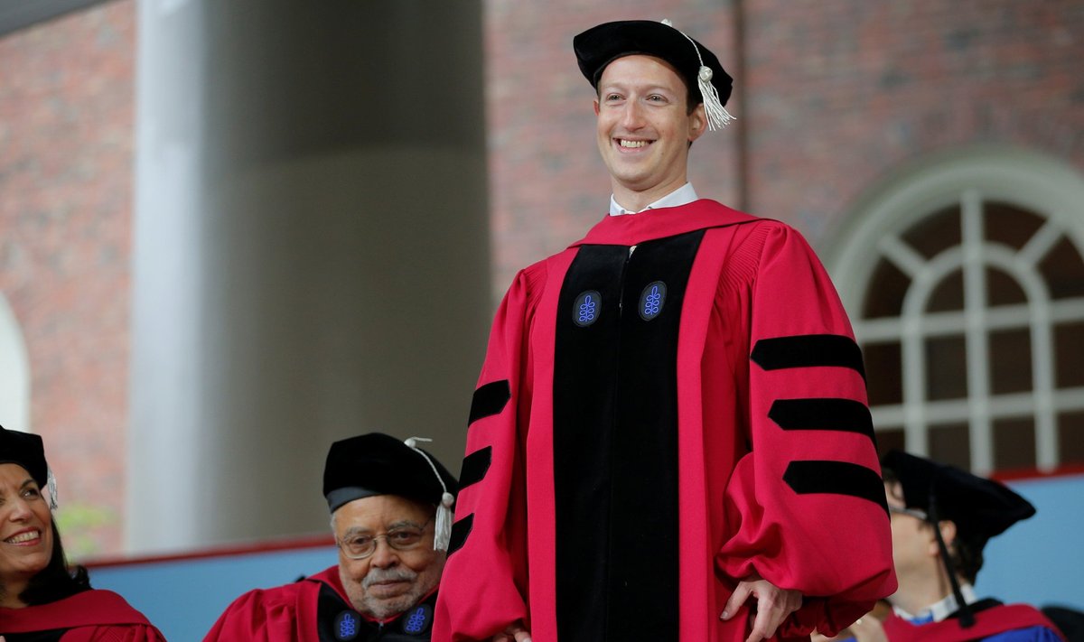 Facebook founder Mark Zuckerberg stands to receive an honorary Doctor of Laws degree during the 366th Commencement Exercises at Harvard University in Cambridge