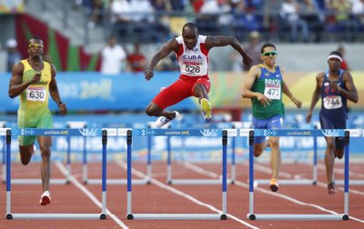 Cuba's Cisneros jumps the final hurdle in the men's 400m hurdles final at the Pan American Games in Guadalajara