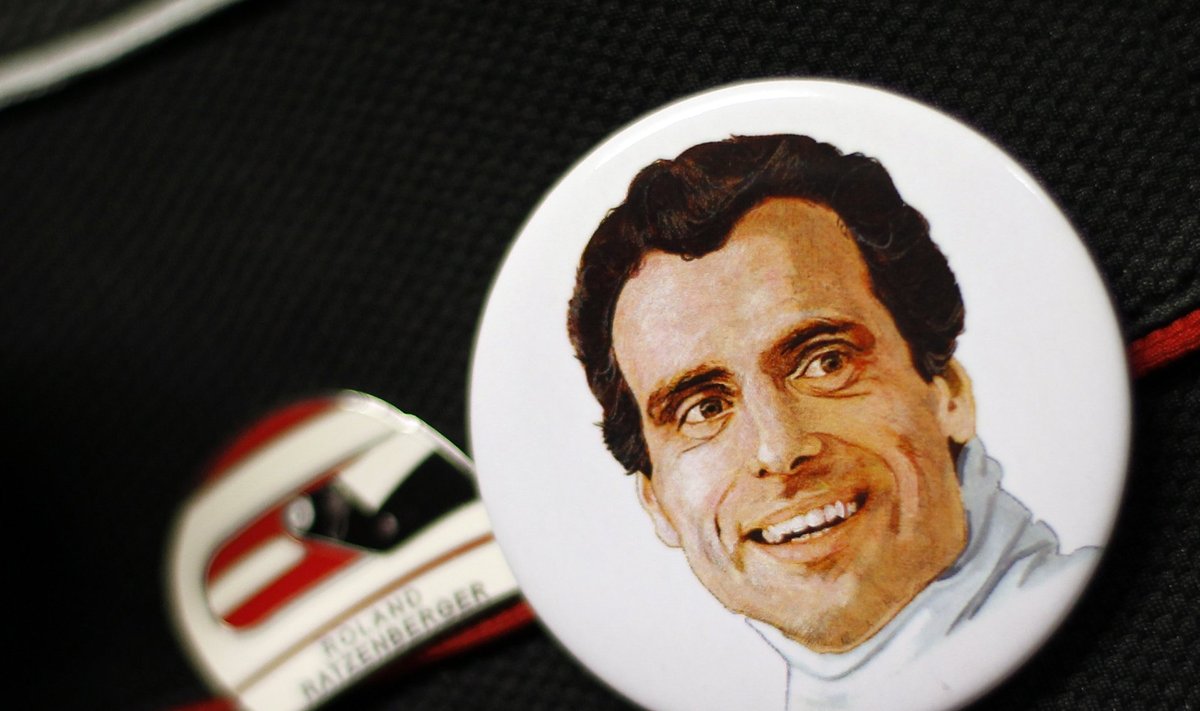 Pin depicting Austrian Formula One driver Ratzemberger is pictured during a mass at the Imola race track