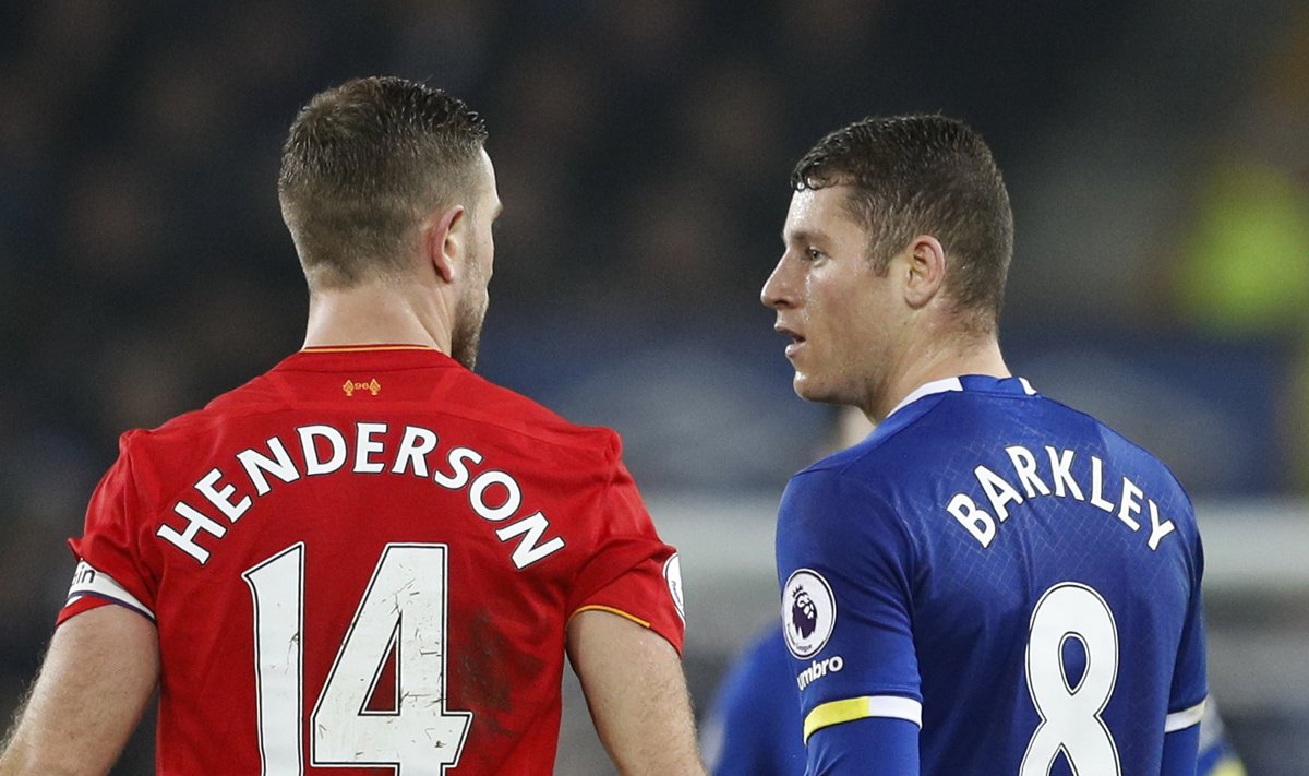 Liverpool's Jordan Henderson clashes with Everton's Ross Barkley