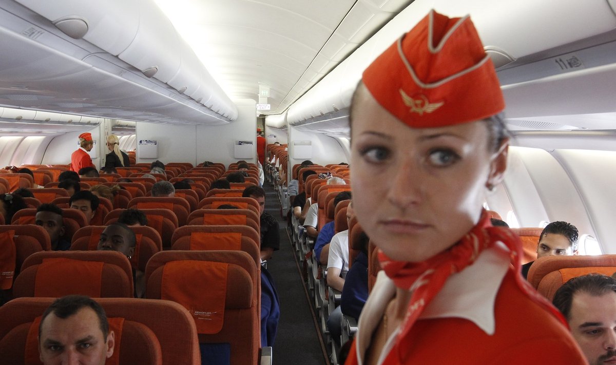 People sit onboard an Aeroflot Airbus A330 plane heading to the Cuban capital Havana at Moscow's Sheremetyevo airport