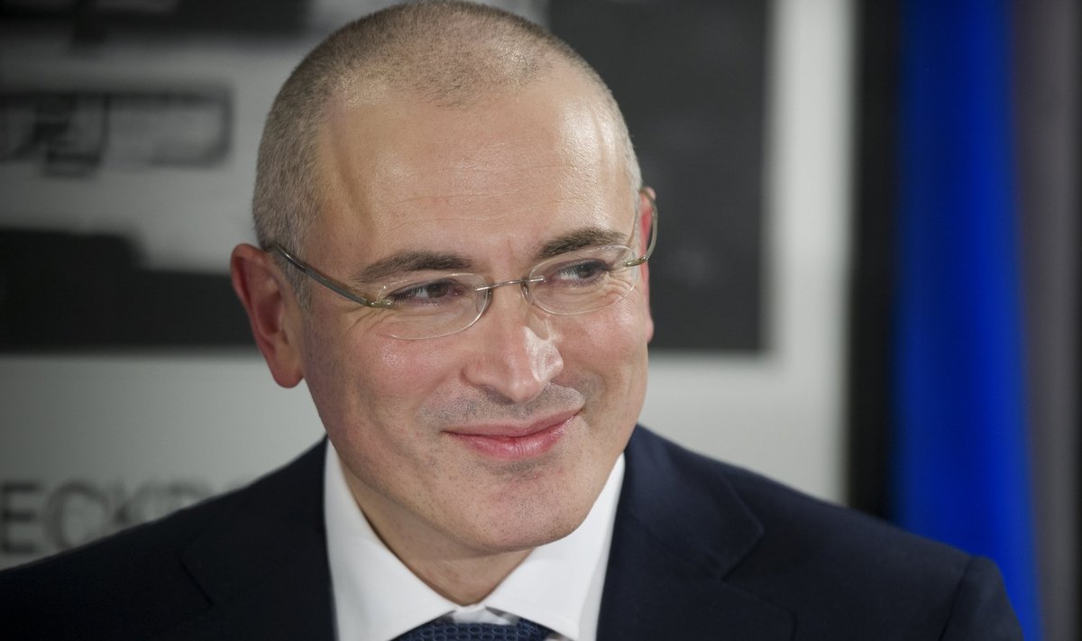 Freed Russian fomer oil tycoon Khodorkovsky reacts during his news conference in the Museum Haus am Checkpoint Charlie in Berlin