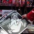 FOTOD ja VIDEO: Aasta Charlie Hebdo veresaunast: pilapilt jumalast ja trükiviga mälestustahvlil