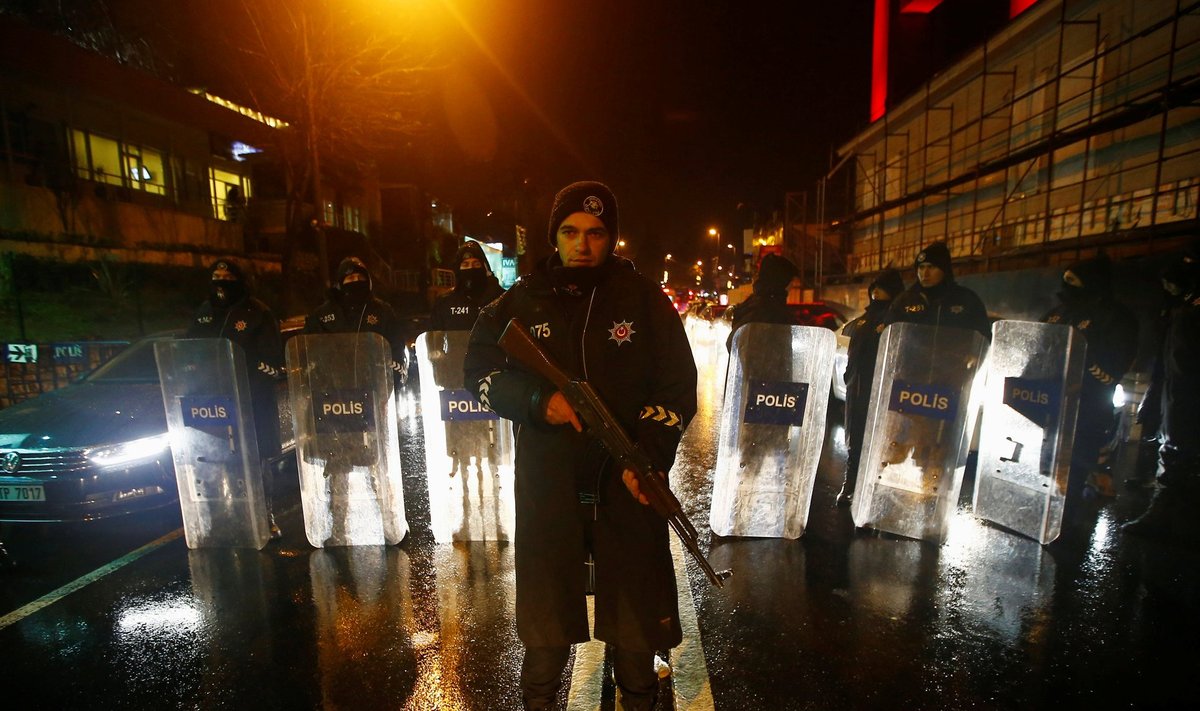 Police secure an area near an Istanbul nightclub, following a gun attack