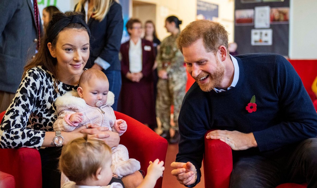 Britain’s Prince Harry and Meghan, Duchess of Sussex attend a coffee morning with families of deployed Army personnel, in Windsor