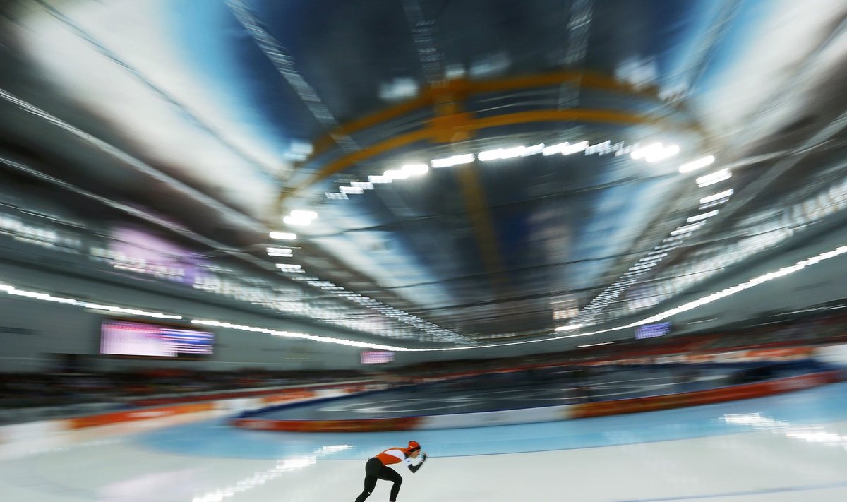 Irene Wust of the Netherlands skates to first place during the women's 3,000 metres speed skating race at the Adler Arena during the Sochi 2014 Winter Olympics