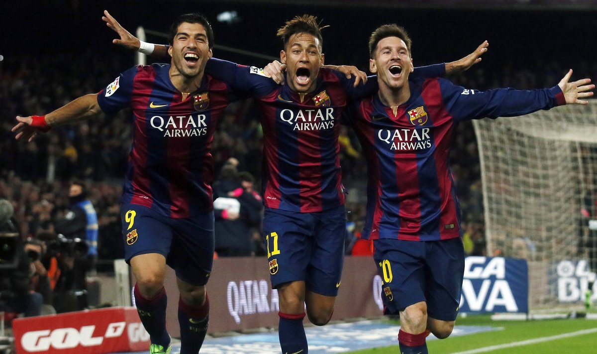 Barcelona's Suarez, Neymar and Messi celebrate a goal against Atletico Madrid during their Spanish First Division soccer match in Barcelona