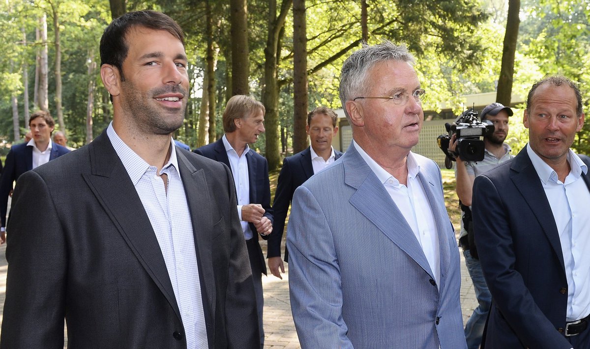 New soccer coach of the Netherlands Hiddink walks with assistant coaches van Nistelrooy and Blind after a presentation of the new staff of the Dutch national football team in Zeist