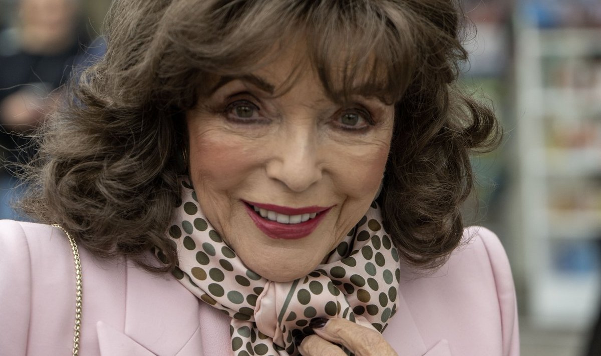 Dame Joan Collins re-opens children's charity shop