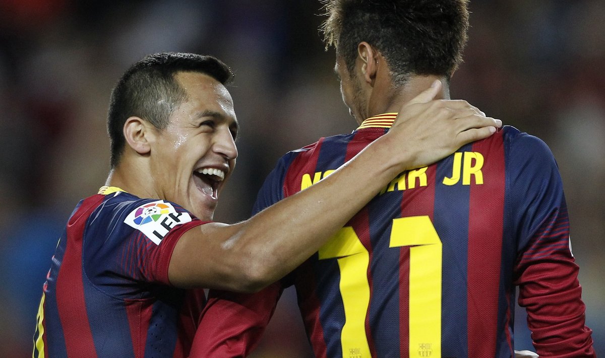 Barcelona's Sanchez celebrates a goal against Espanyol during their Spanish First division soccer league match in Barcelona