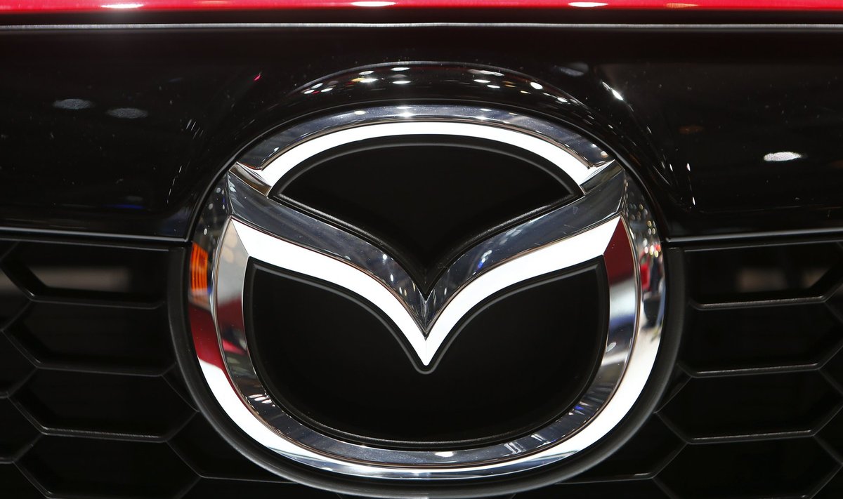 The company logo is seen on the bonnet of a Mazda car during the media day ahead of the 84th Geneva Motor Show at the Palexpo Arena in Geneva