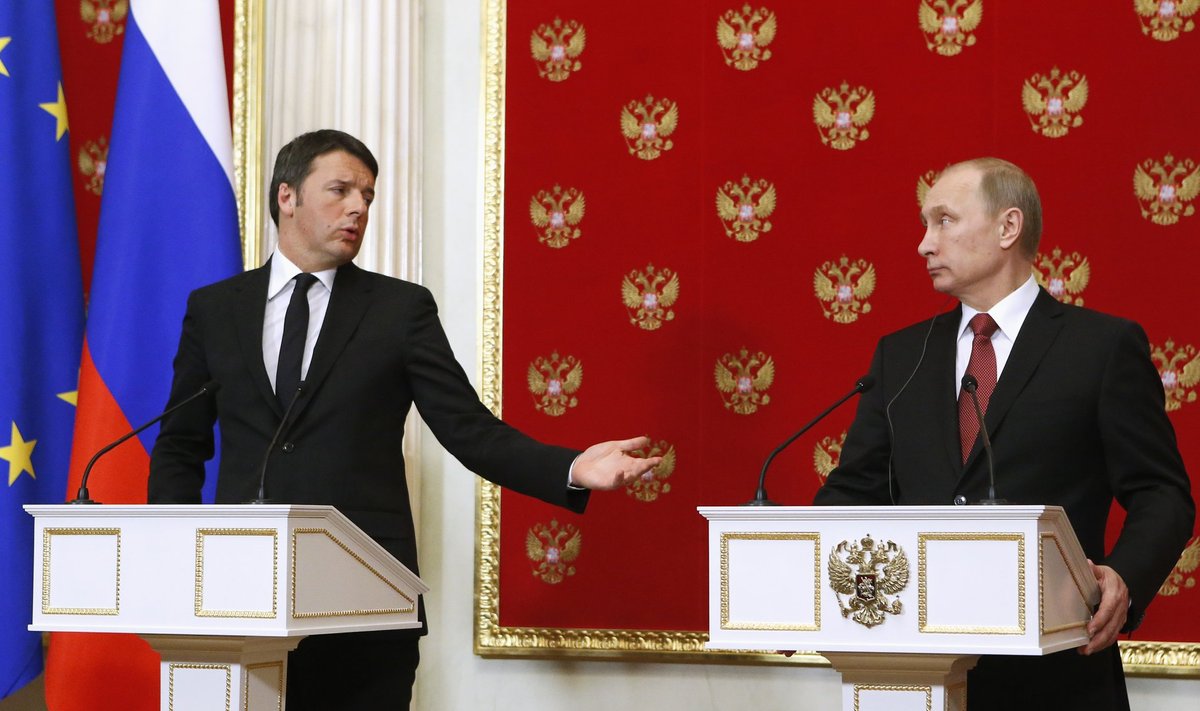 Italian Prime Minister Matteo Renzi gestures during a news conference with Russian President Vladimir Putin following their meeting at the Kremlin in Moscow