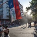 Десятки тысяч недовольных властями вышли на улицы столицы Чили. Повод — повышение цен на метро