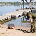 Водолазы отрабатывали разминирование под водой в карьере Румму 