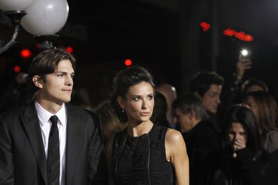 File photo of cast member Kutcher and his wife Moore attending the premiere of "No Strings Attached" at the Regency Village theatre in Los Angeles