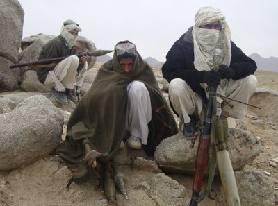 File photo of Taliban fighters posing with weapons in an undisclosed location in Afghanistan