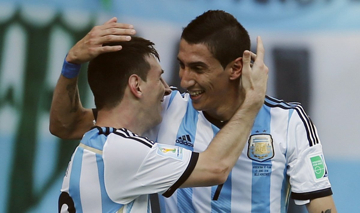 Argentina's Messi celebrates his goal against Iran with Di Maria during their 2014 World Cup Group F soccer match at the Mineirao stadium in Belo Horizonte