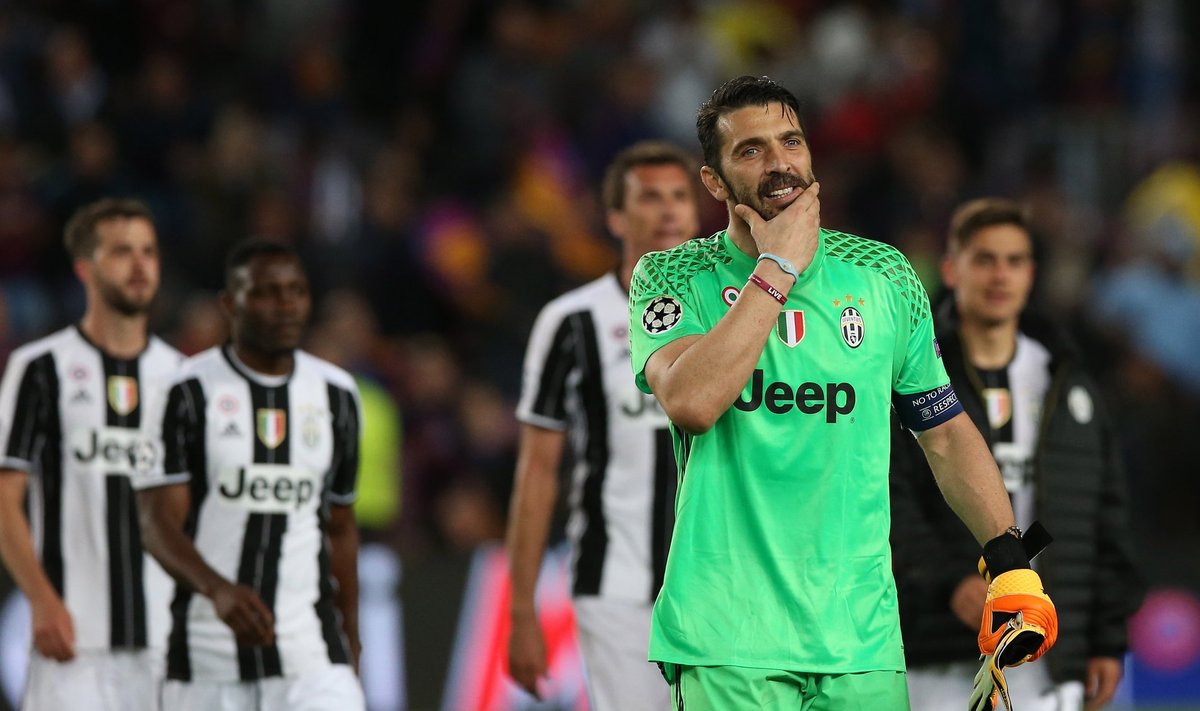 Juventus' Gianluigi Buffon celebrates after the match