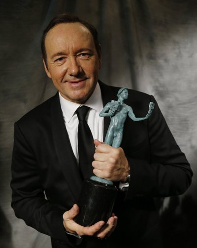 Actor Kevin Spacey poses backstage with his award for Outstanding Performance by a Male Actor in a Drama Series for his role in "House of Cards" at the 22nd Screen Actors Guild Awards in Los Angeles