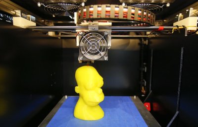 Foto: AFP (Fabmakeri 3D printer messil)