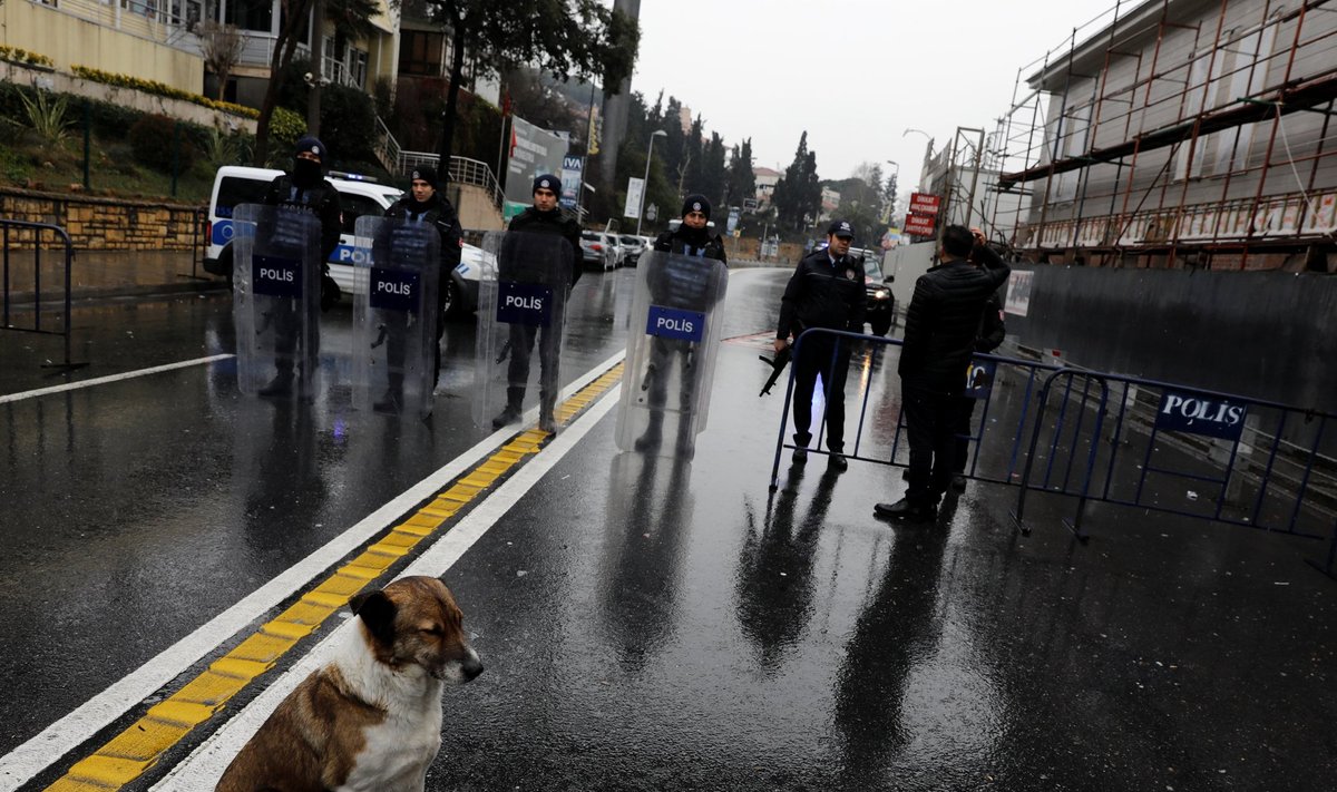Police stand guard near the Reina nightclub, which was attacked by a gunman, in Istanbul