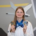 ФОТО | Новоиспеченную чемпионку Энели Ефимову торжественно встретили в таллиннском аэропорту