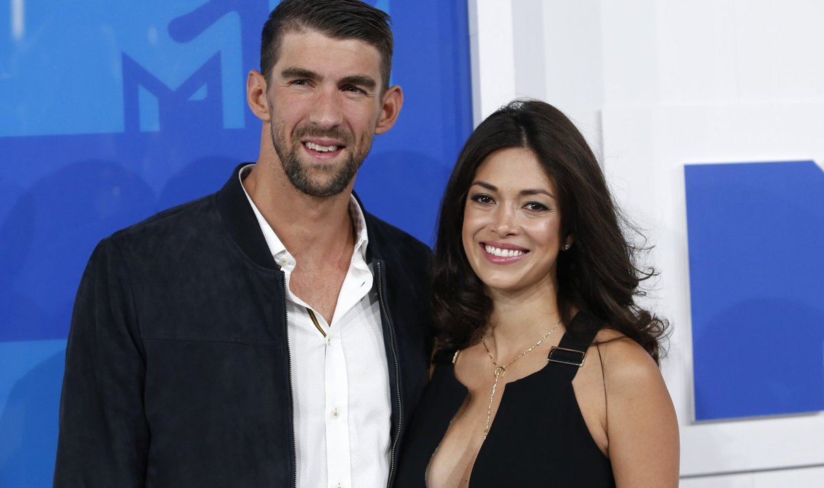 Olympic swimmer Michael Phelps and fiance Nicole Johnson arrive at the 2016 MTV Video Music Awards in New York