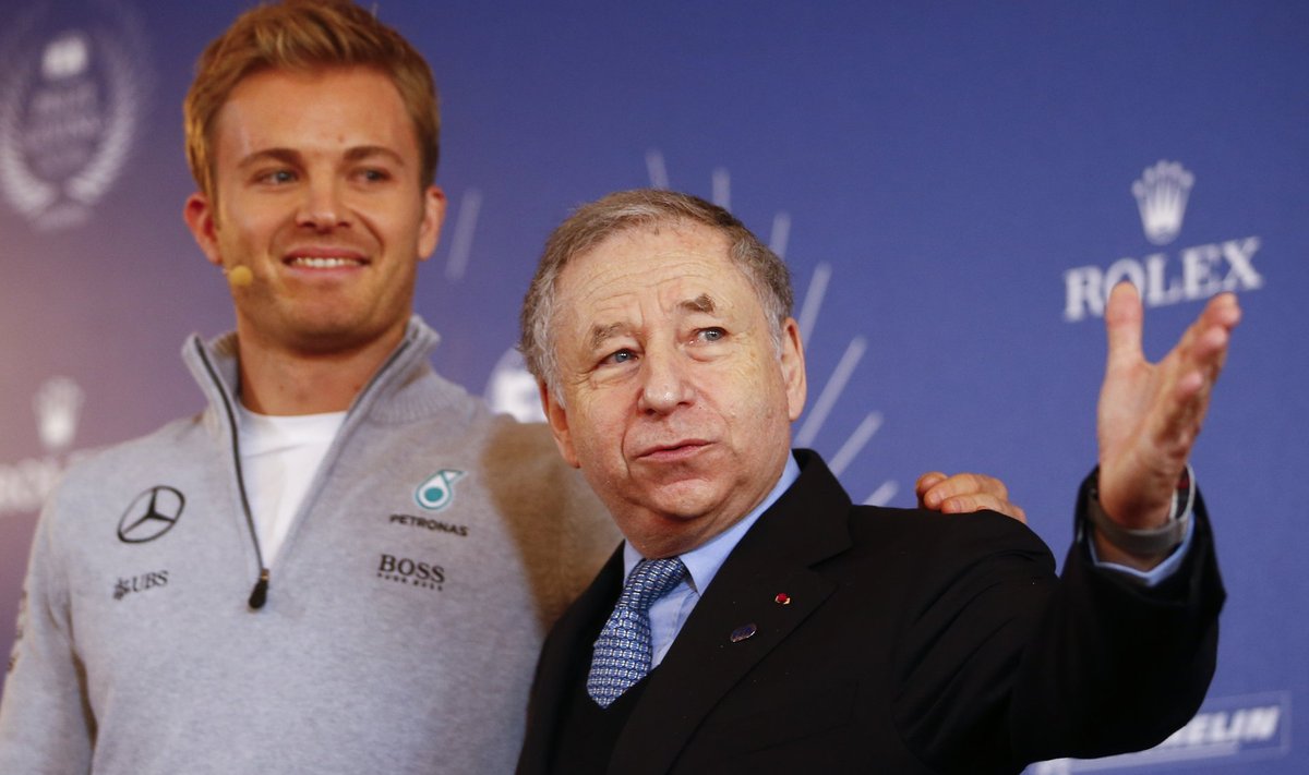 Mercedes' Formula One World Champion Nico Rosberg of Germany poses with Jean Todt, Federation Internationale de l'Automobile (FIA) President in Vienna