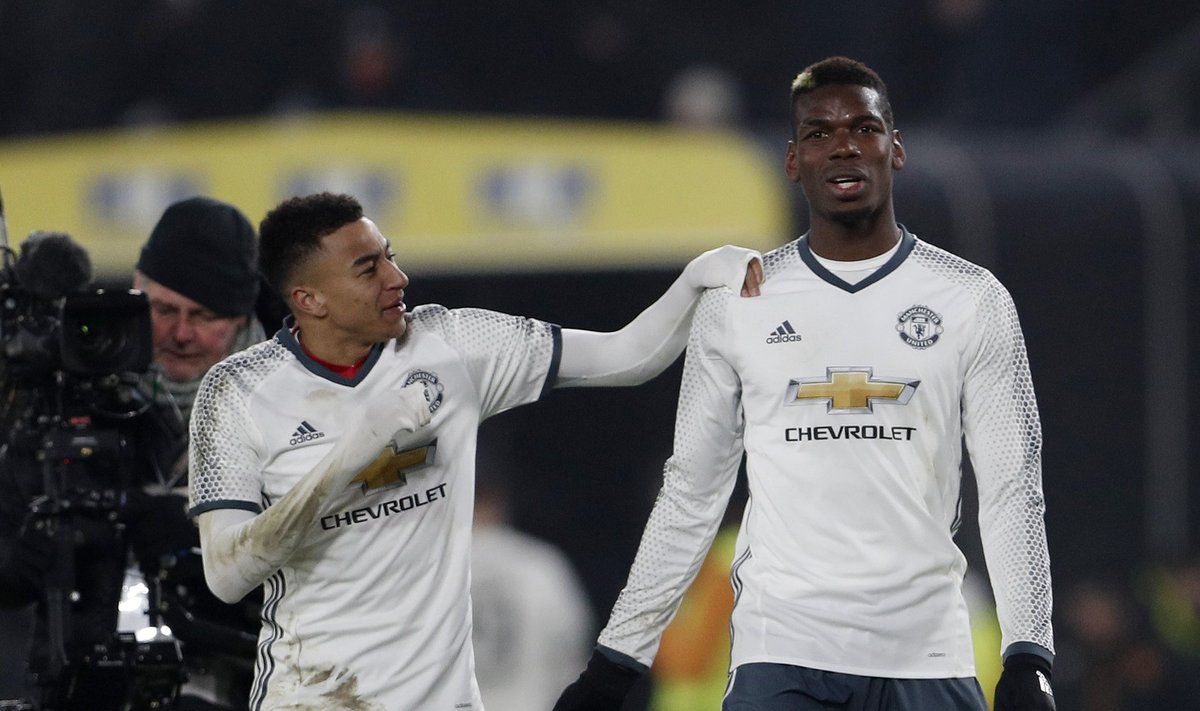 Manchester United's Jesse Lingard and Manchester United's Paul Pogba after the match