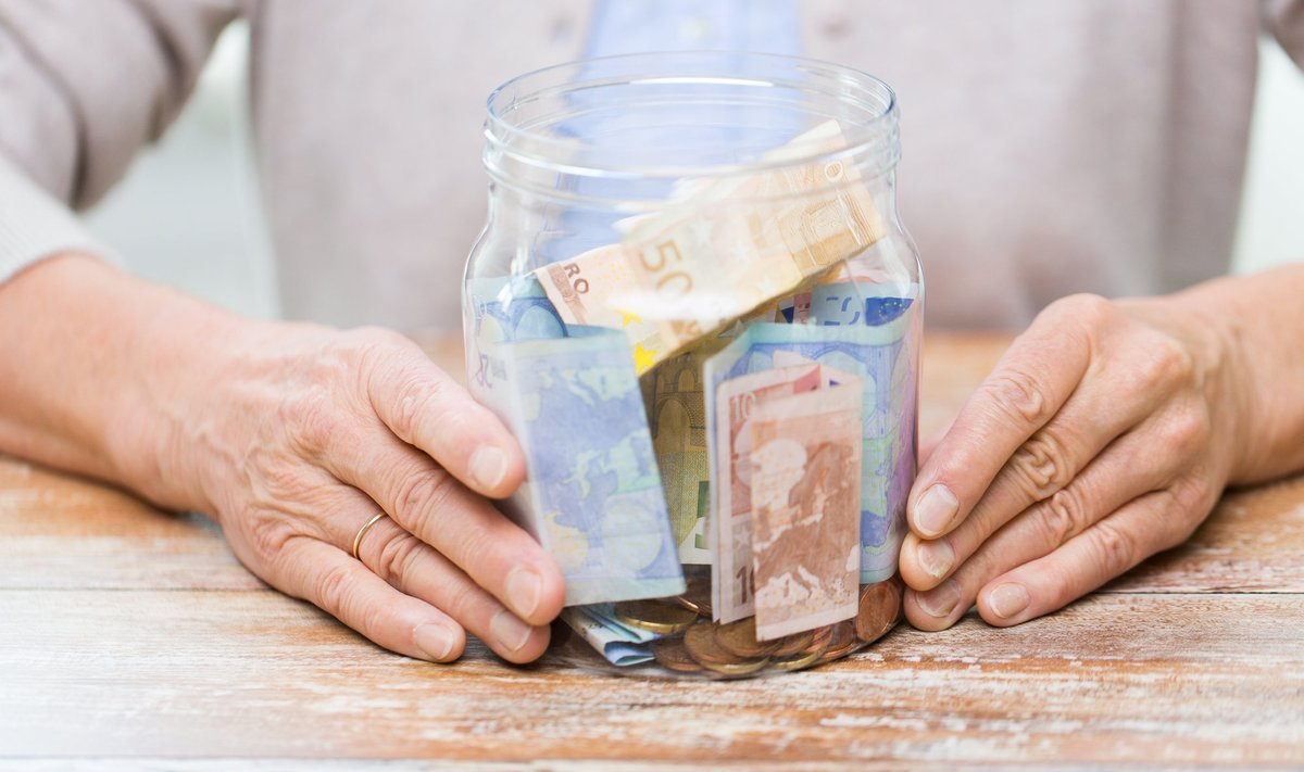 Savings,,Money,,Annuity,Insurance,,Retirement,And,People,Concept,-,Close