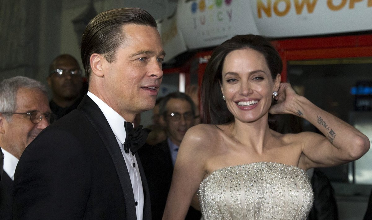 Director and cast member Jolie and her husband and co-star Pitt arrive at the premiere of "By the Sea" during the opening night of AFI FEST 2015 in Hollywood