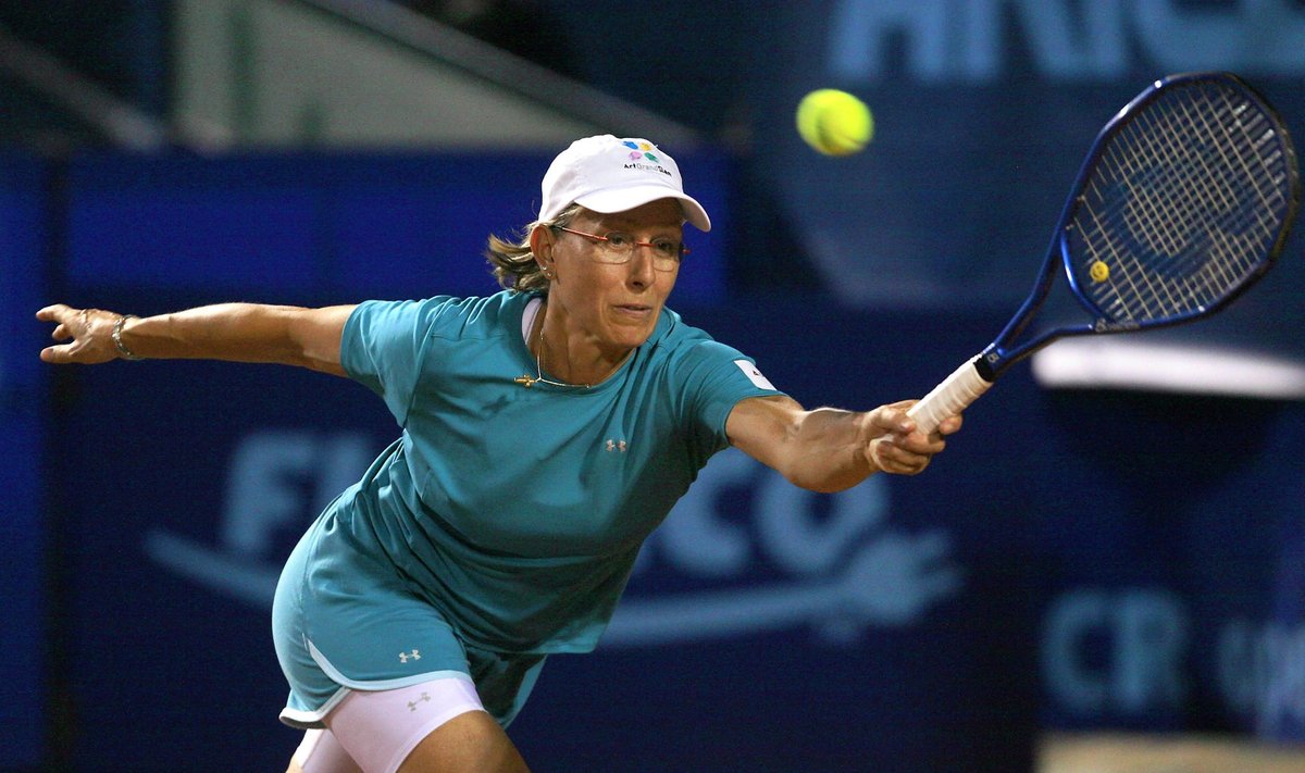 File photo of tennis great Navratilova of the U.S. returns a shot to Seles during their demonstrative match at the BCR Open Romania tennis tournament in Bucharest