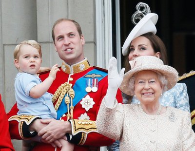 Britain's Prince Willian holding Prince George, Catherine, the Duchess of Cambridge and Queen Elizabeth stand on the balcony at Buckingham Palace after attending the Trooping the Colour ceremony at Horse Guards Parade in central London