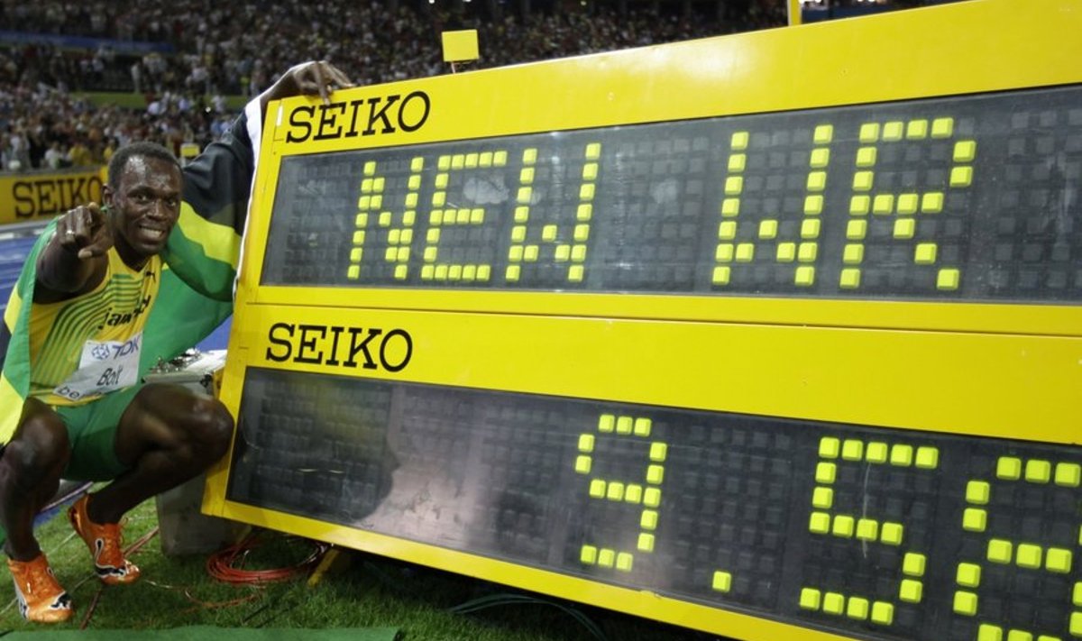 Usain Bolt of Jamaica celebrates after winning the men's 100 metres final during the world athletics championships at the Olympic stadium in Berlin August 16, 2009. Bolt won the race int a time of 9.58 seconds setting a new world record. REUTERS/Kai Pfaffenbach (GERMANY SPORT ATHLETICS)
