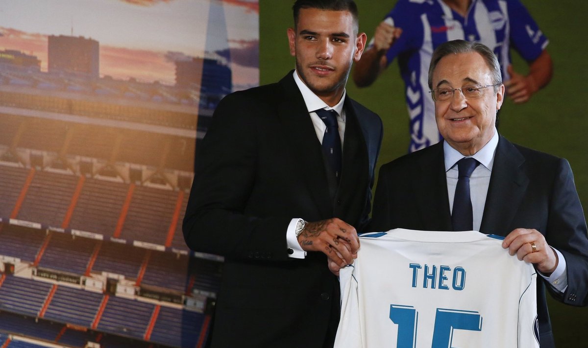 Real Madrid's President Florentino Perez poses with Real Madrid's new player Theo Hernandez during his presentation at the Santiago Bernabeu Stadium in Madrid