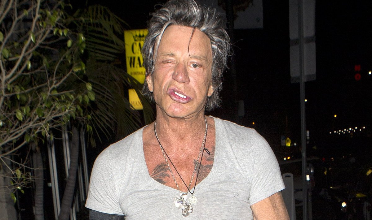 Mickey Rourke was in good spirits as he pulled some strange faces as he arrived at 'The Nice Guy' bar in West Hollywood, CA