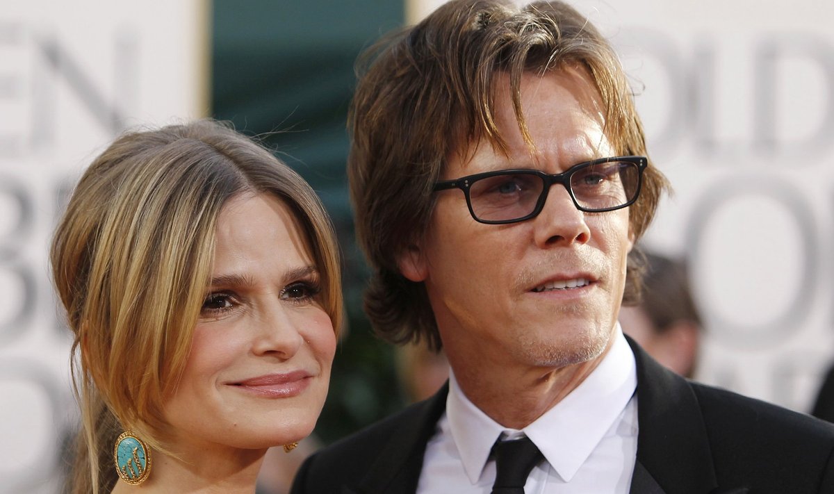 Actress Kyra Sedgwick and her husband, actor Kevin Bacon, arrive at the 68th annual Golden Globes Awards in Beverly Hills
