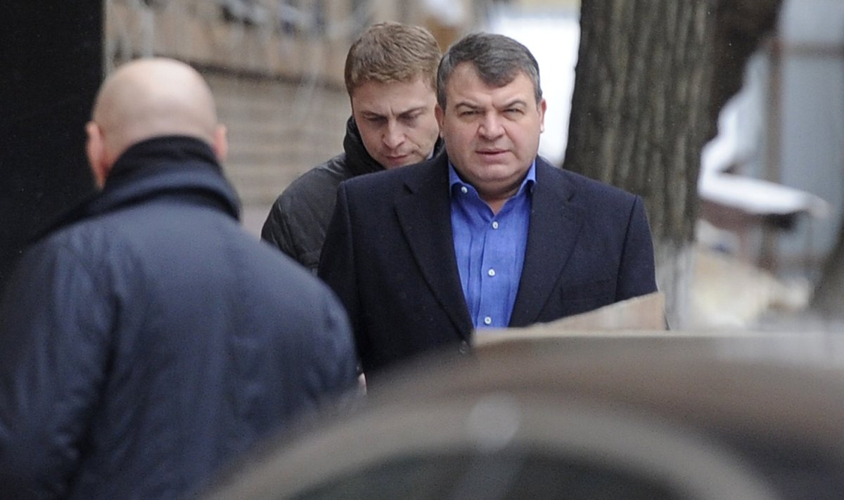 Former Russian Defence Minister Serdyukov arrives by a back entrance for questioning by investigators in Moscow