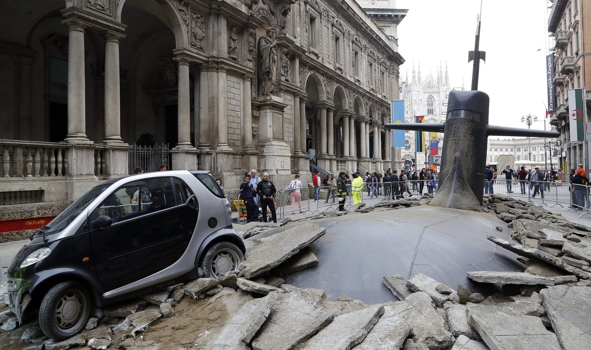A submarine and a car are featured as part of an installation for an advertising campaign in downtown Milan