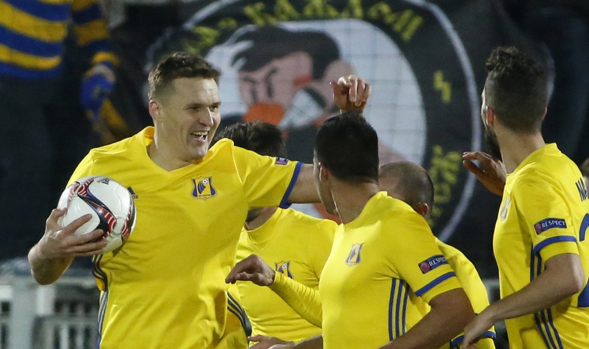FC Rostov's Aleksandr Bukharov celebrates scoring their first goal with team mates