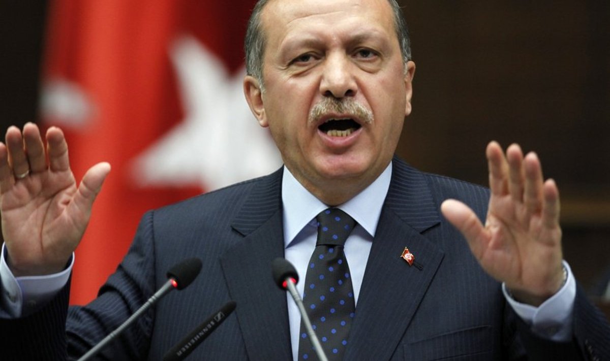 Turkey's Prime Minister Tayyip Erdogan addresses members of the parliament from his ruling AK Party during a meeting at the Turkish parliament in Ankara June 1, 2010. Erdogan urged Israel on Tuesday to lift its "inhumane embargo" on Gaza as soon as possible, in a speech to parliament in which he criticised an Israeli raid on a Turkey-backed aid convoy. REUTERS/Umit Bektas (TURKEY - Tags: POLITICS)