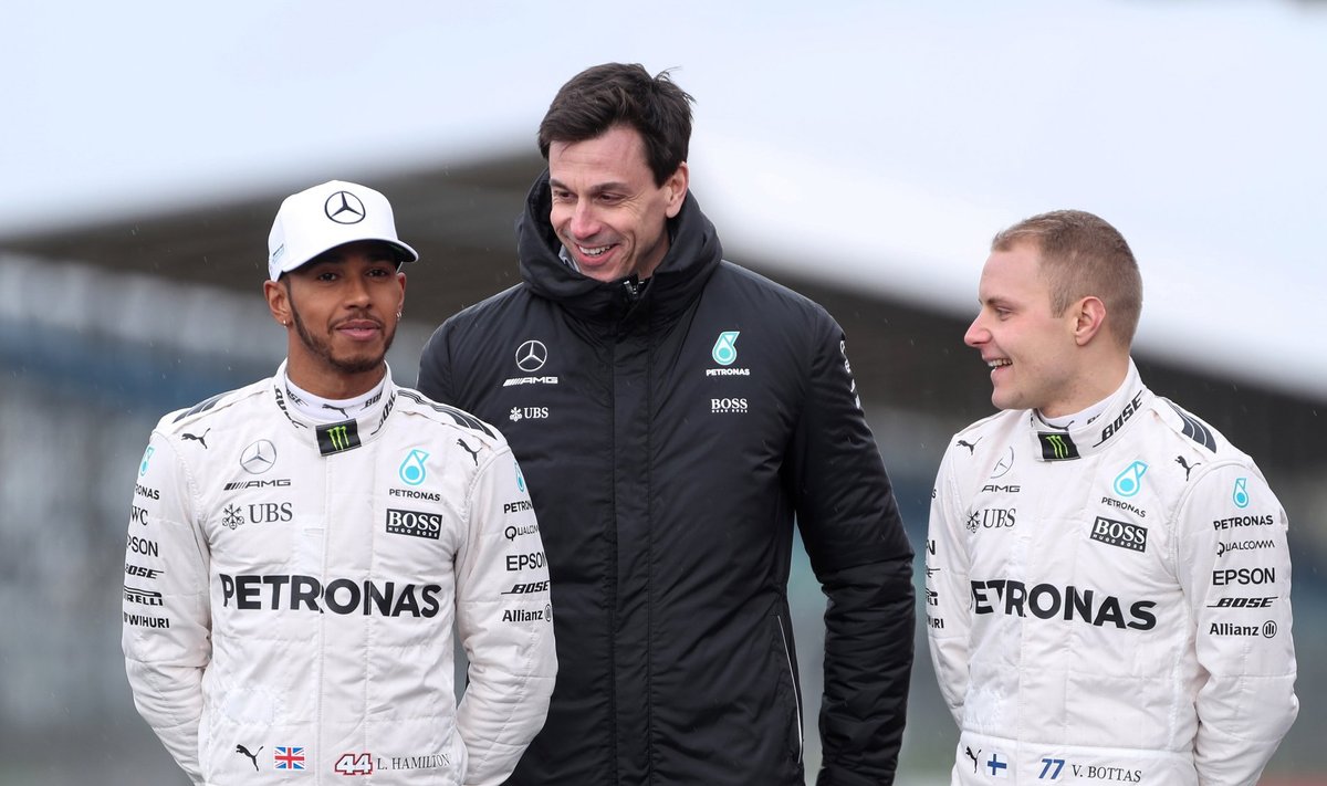 Mercedes' Lewis Hamilton, Executive Director Toto Wolff and Valtteri Bottas pose during the launch