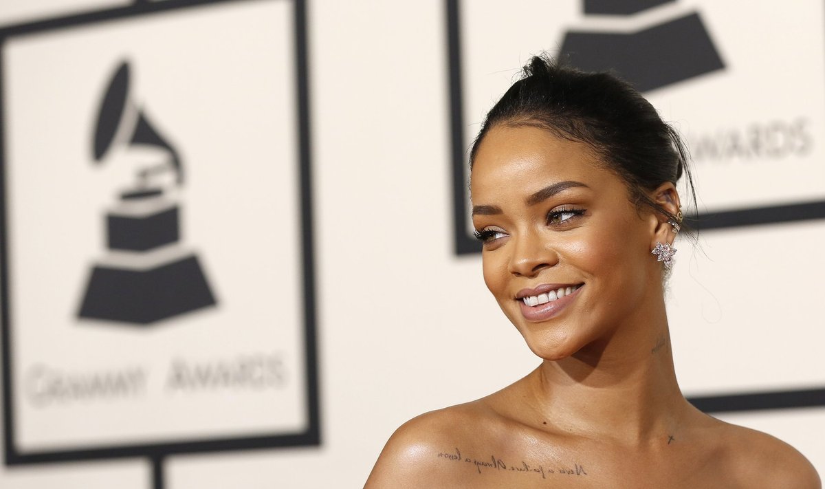 Rihanna arrives at the 57th annual Grammy Awards in Los Angeles