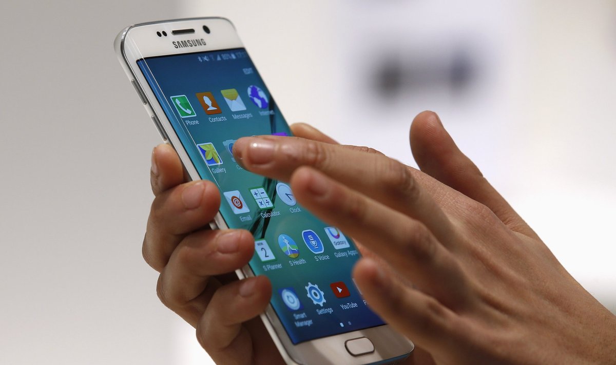 A hostess displays the new Samsung Galaxy S6 Edge smartphone during the Mobile World Congress in Barcelona
