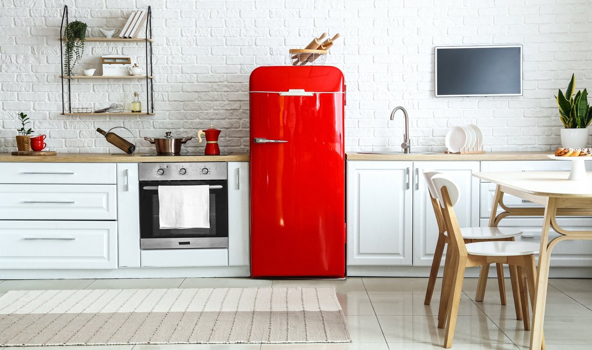 Interior,Of,Light,Kitchen,With,Red,Fridge,,White,Counters,And