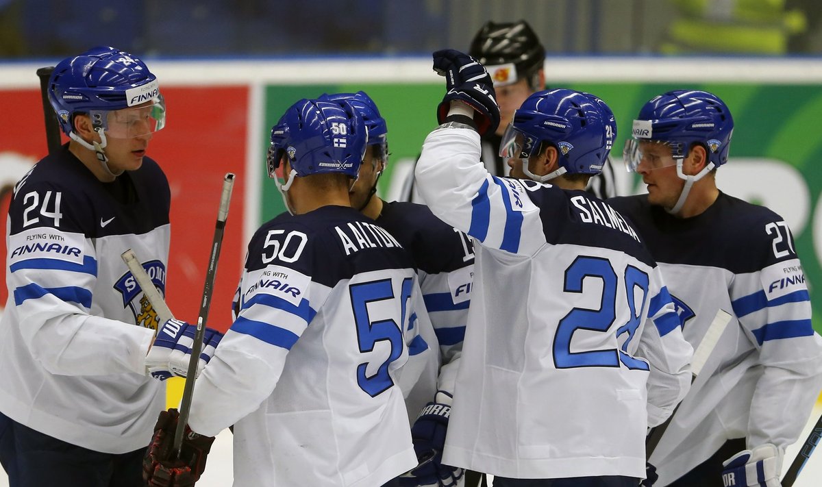 Finland's Kemppainen celebrates his goal against Slovenia with team mates during their Ice Hockey World Championship game at the CEZ arena in Ostrava