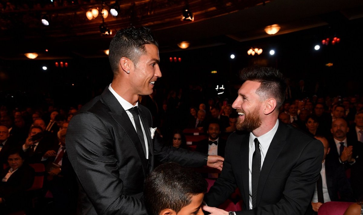 Cristiano Ronaldo pojaga ja Lionel Messi 