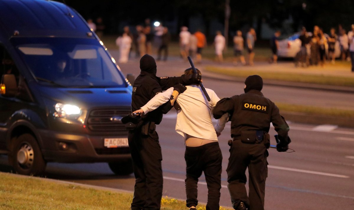 Clashes with opposition supporters after polls closed at the presidential election in Minsk