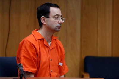 Бывший врач сборной по спортивной гимнастике США Ларри Нассар в 2017 году в суде по делу о домогательствах